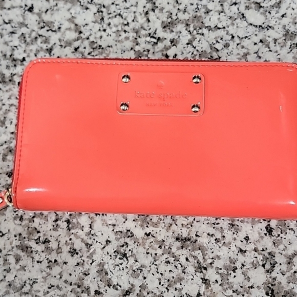 kate spade Handbags - Kate Spade neon orange wallet